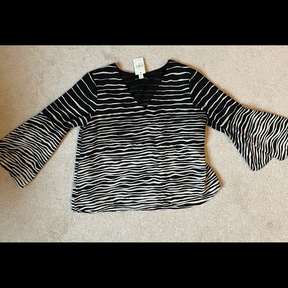 Brand new, size small, women’s business casual blouse from Cato